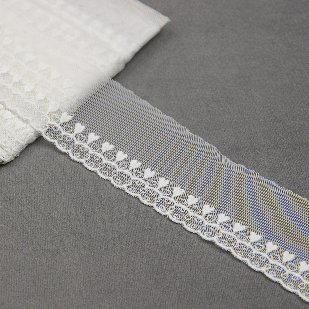 Тесьма на сетке 1675-7 молочный шир.5см/уп.82,3м